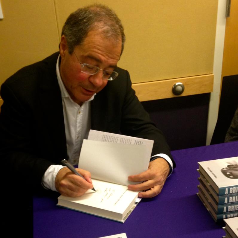 Göran Rosenberg meets with students and signs books (Photo: Hannah Pressman, UW Jewish Studies)